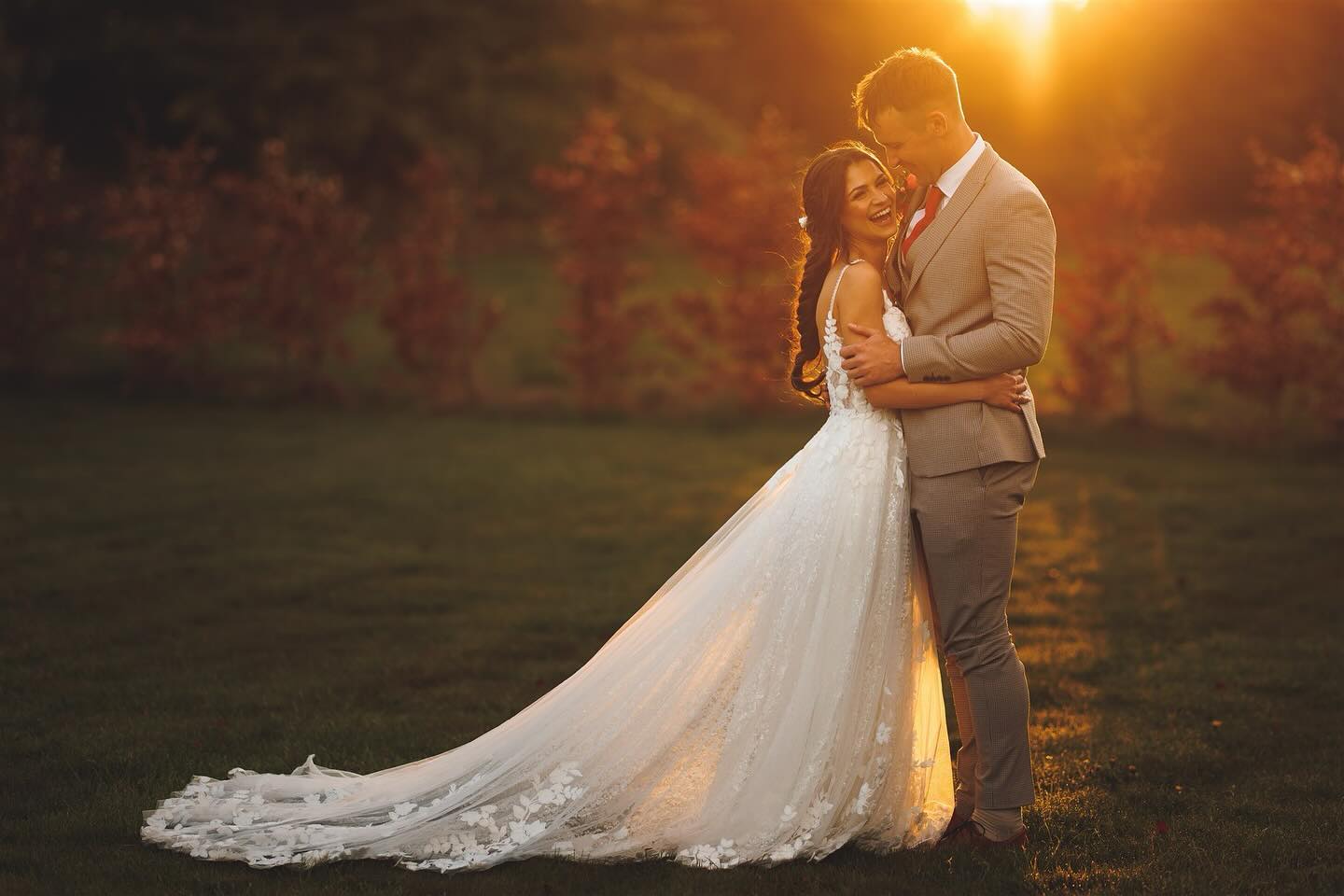 Herefordshire wedding photographer captures a sunset wedding portrait of a bride and groom at Bredenbury Court Barns in Herefordshire.