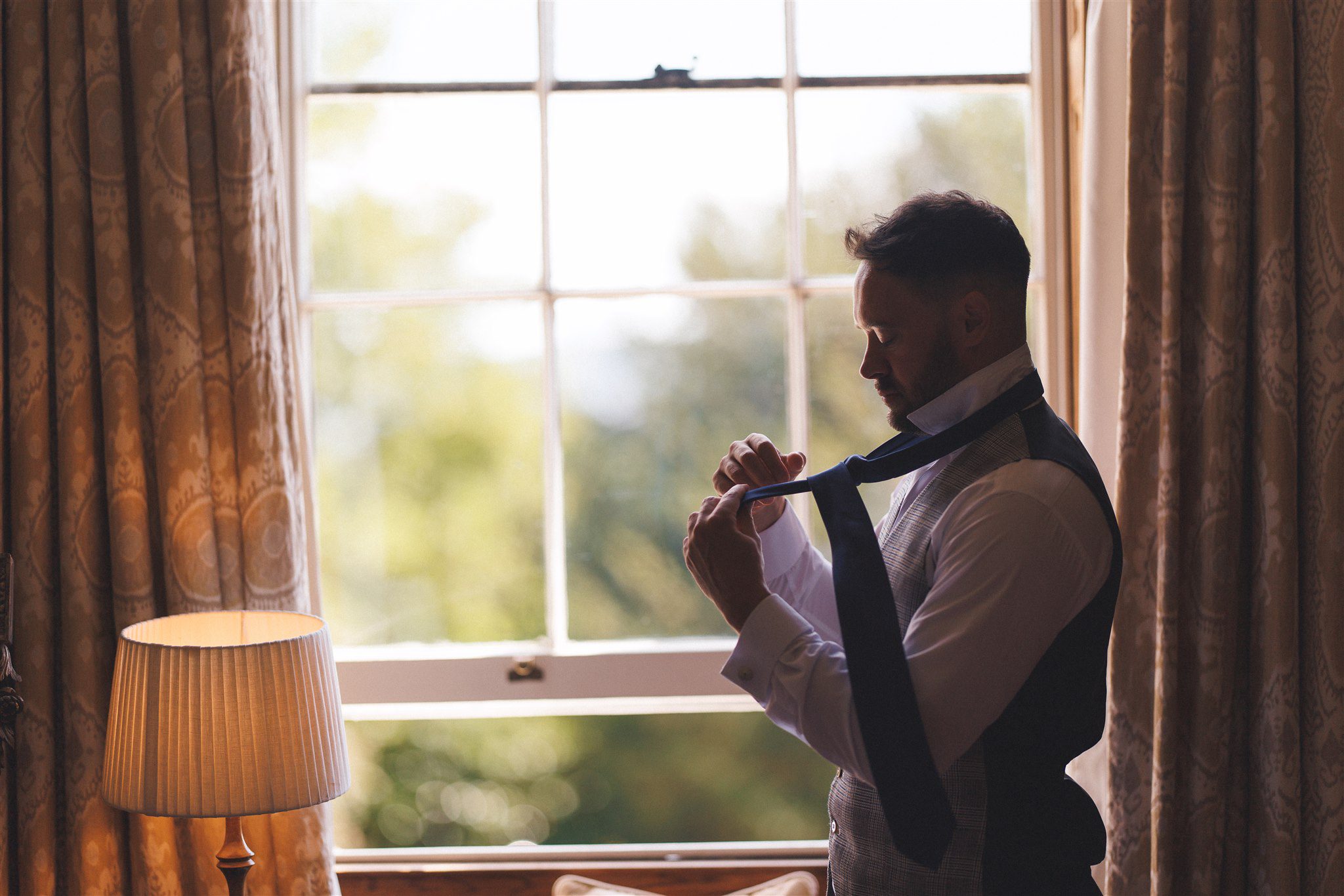 Ben and his groomsmen getting ready at Elmore Court