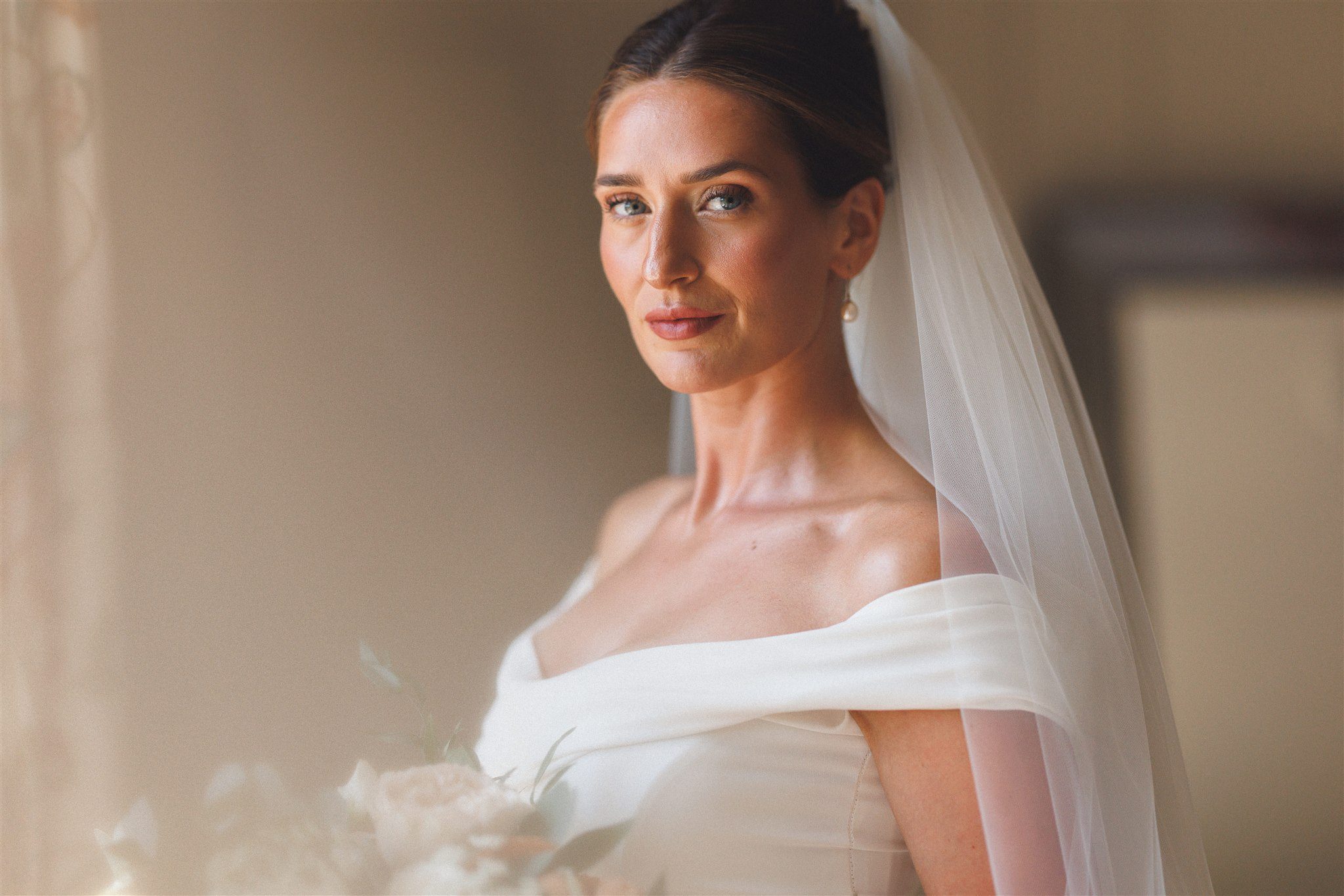 Portrait of Zofia in her dress and veil before the ceremony at Elmore Court