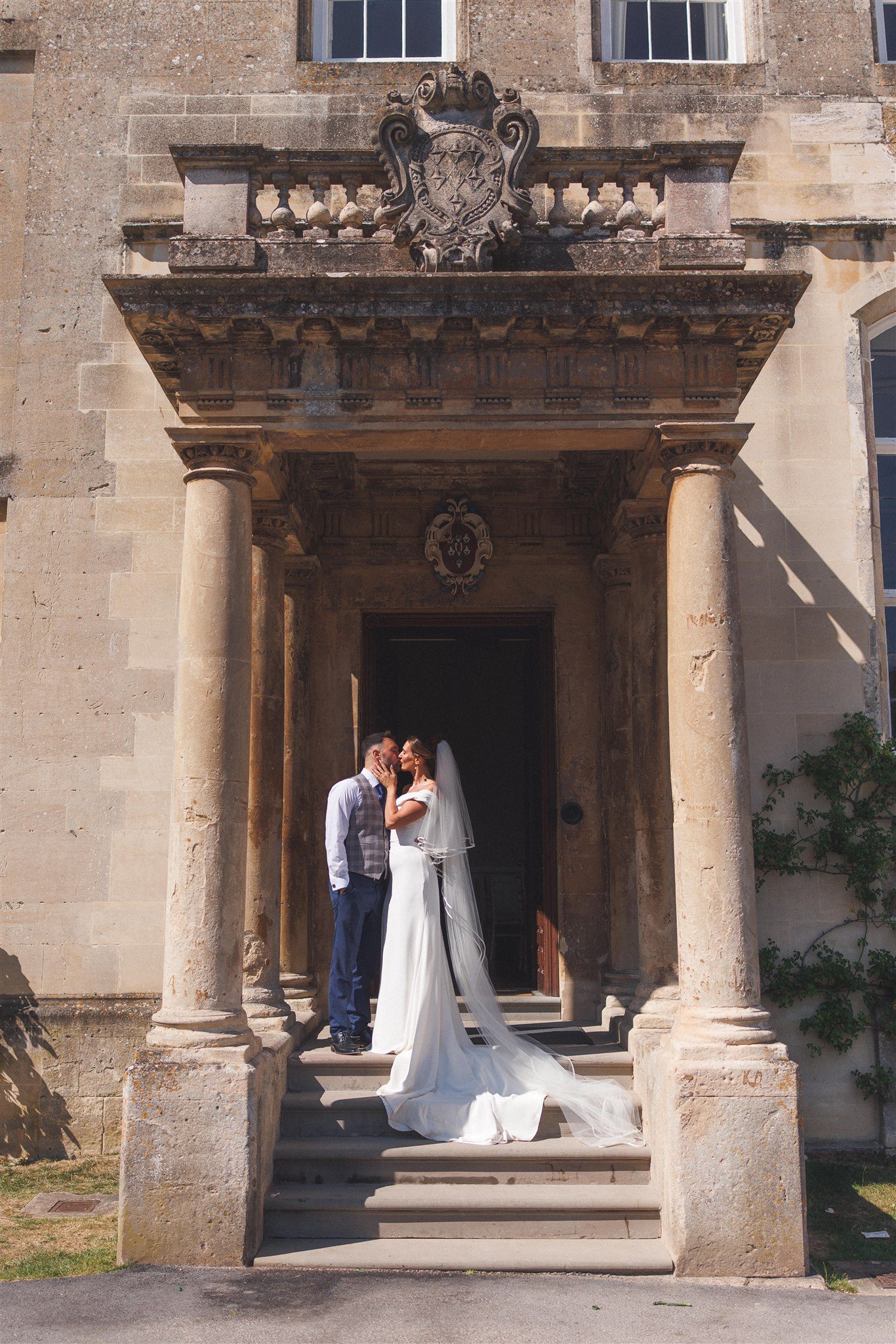 Zofia and Ben in the stone doorway at Elmore Court
