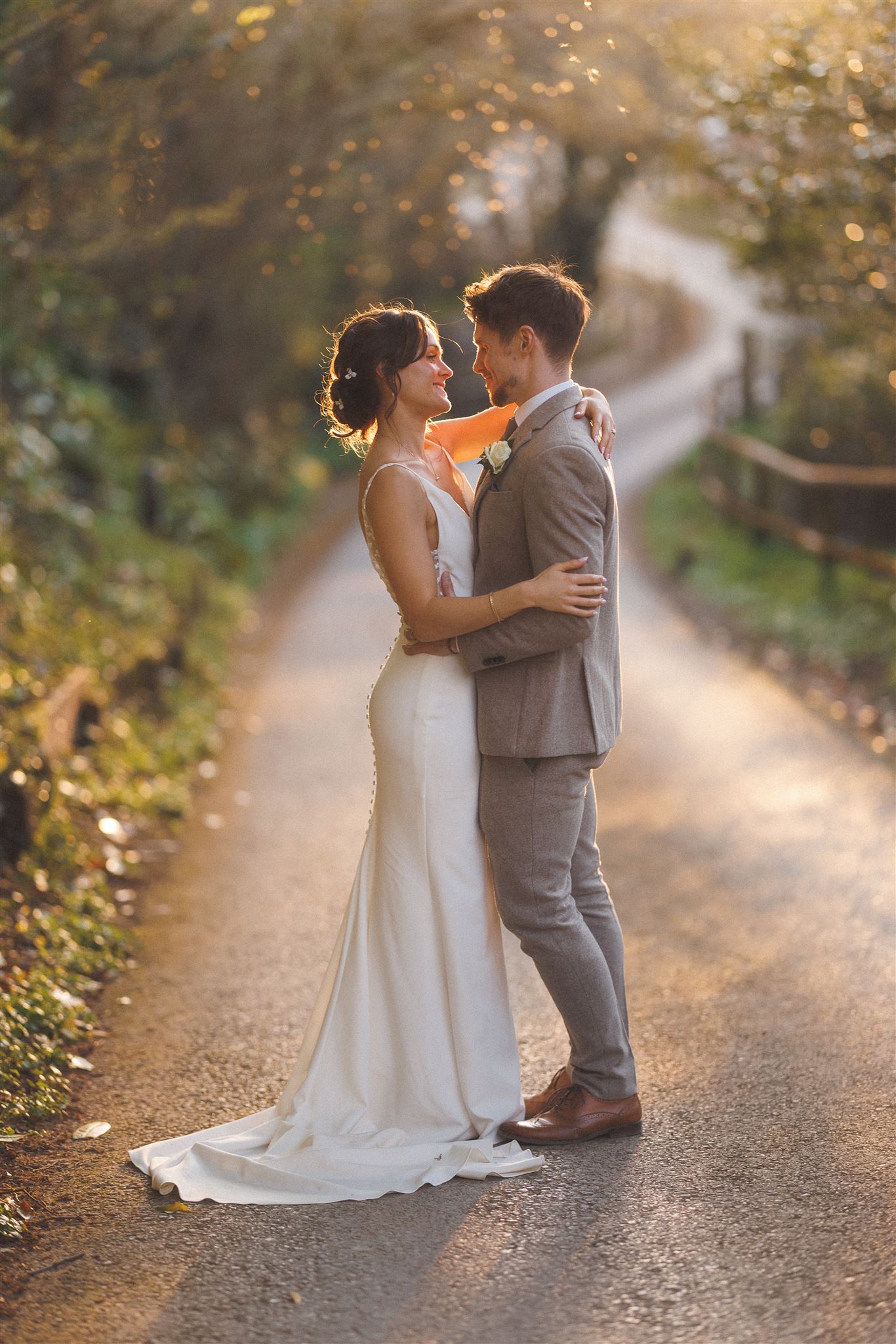 A couple walking together in the late afternoon light
