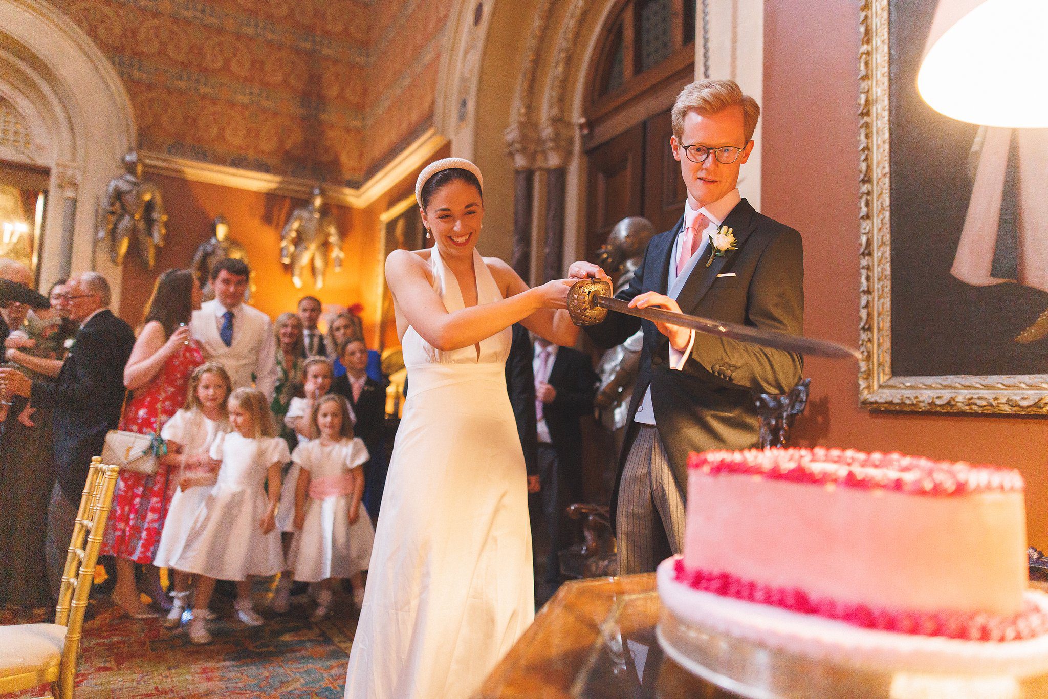 Lucinda and Tom cutting the cake