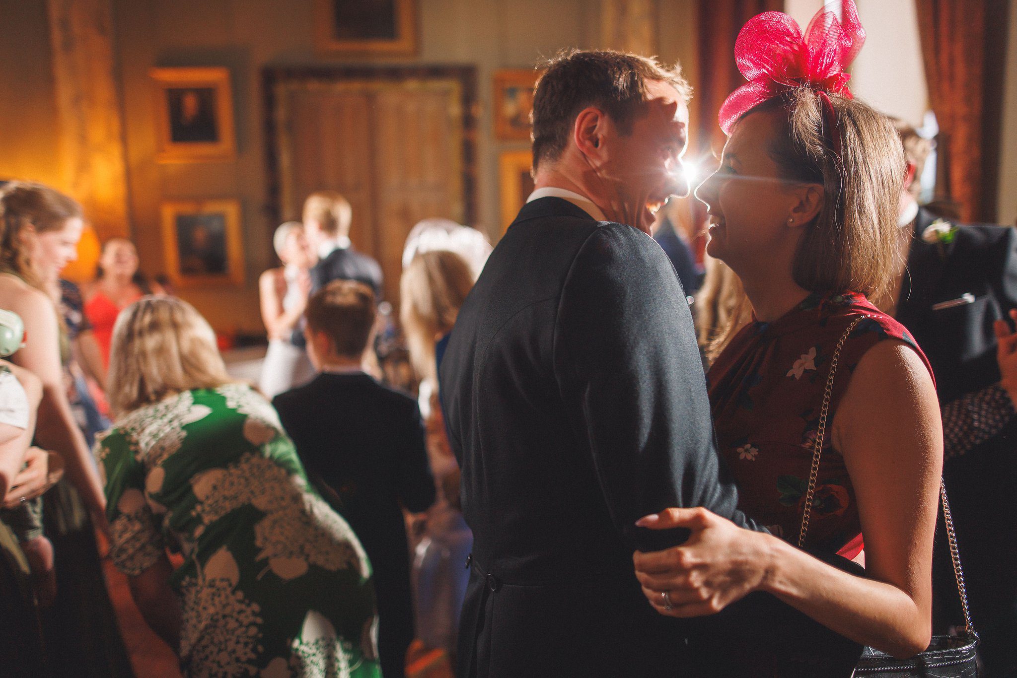 Guests dancing in the drawing room