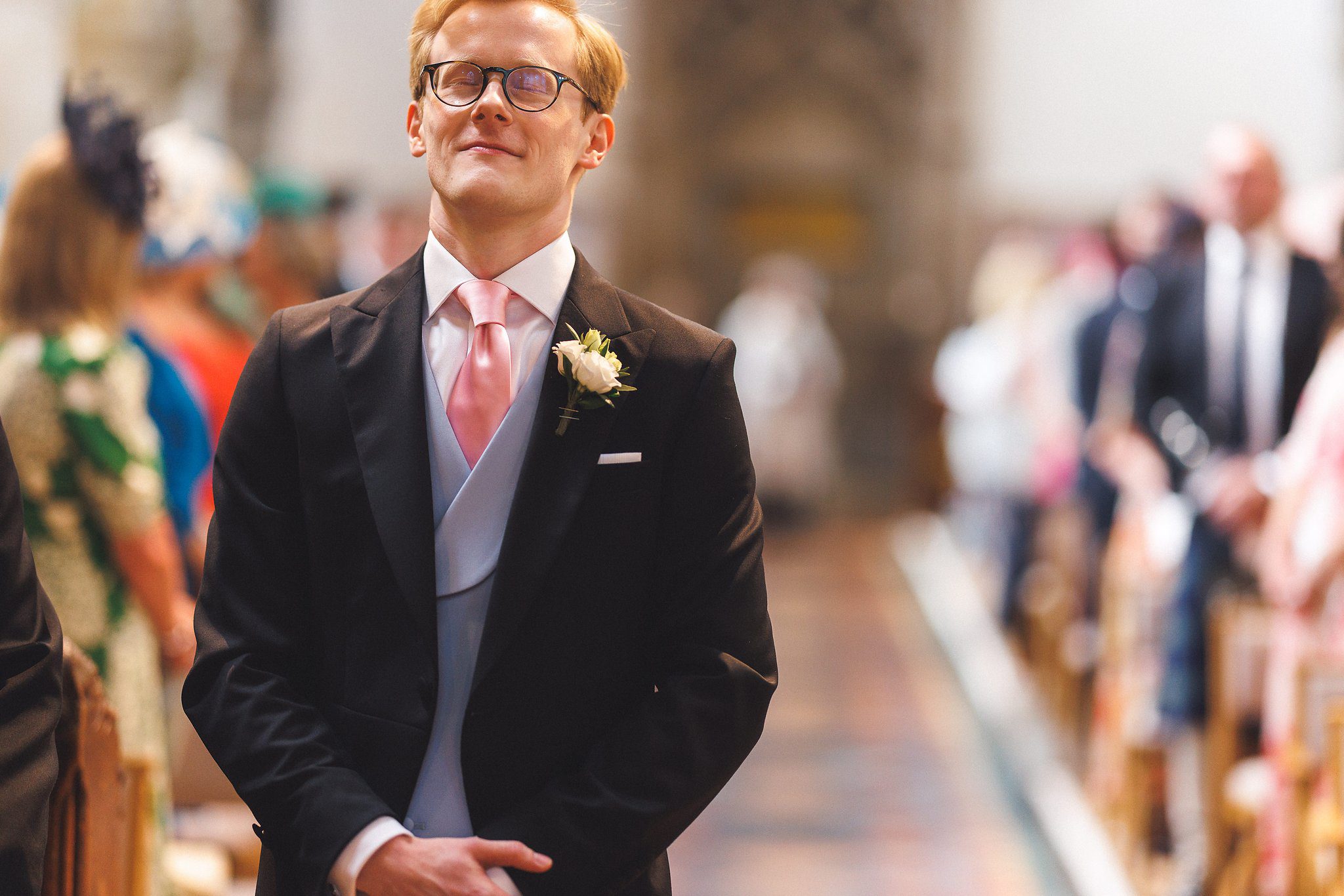 A groomsman waiting for the bride to arrive