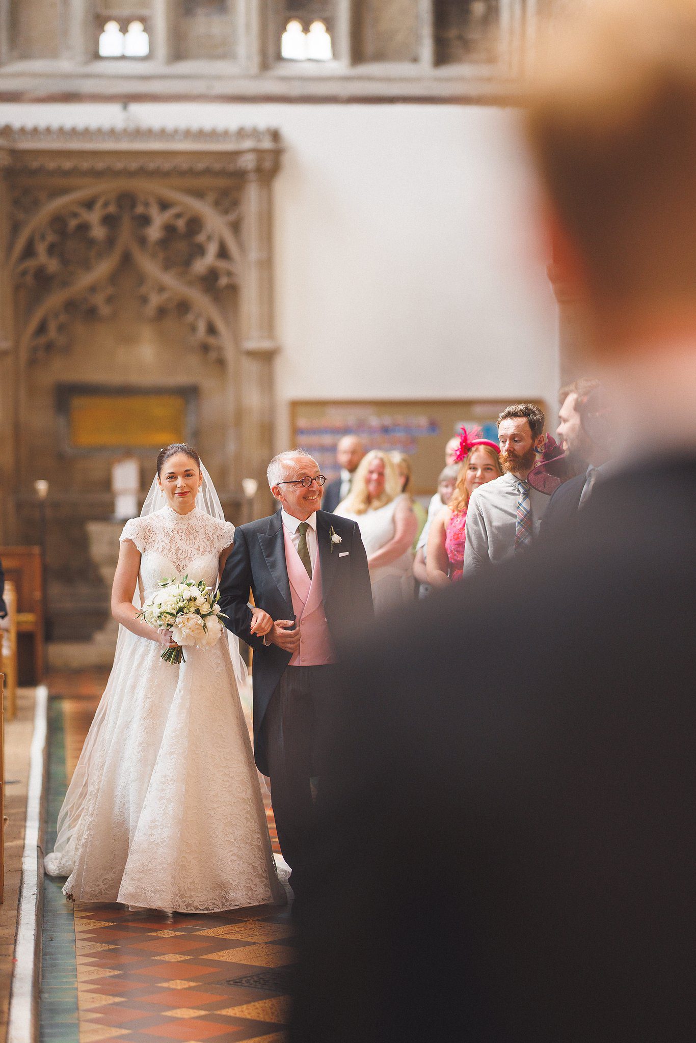 Lucinda coming up the aisle on her father’s arm