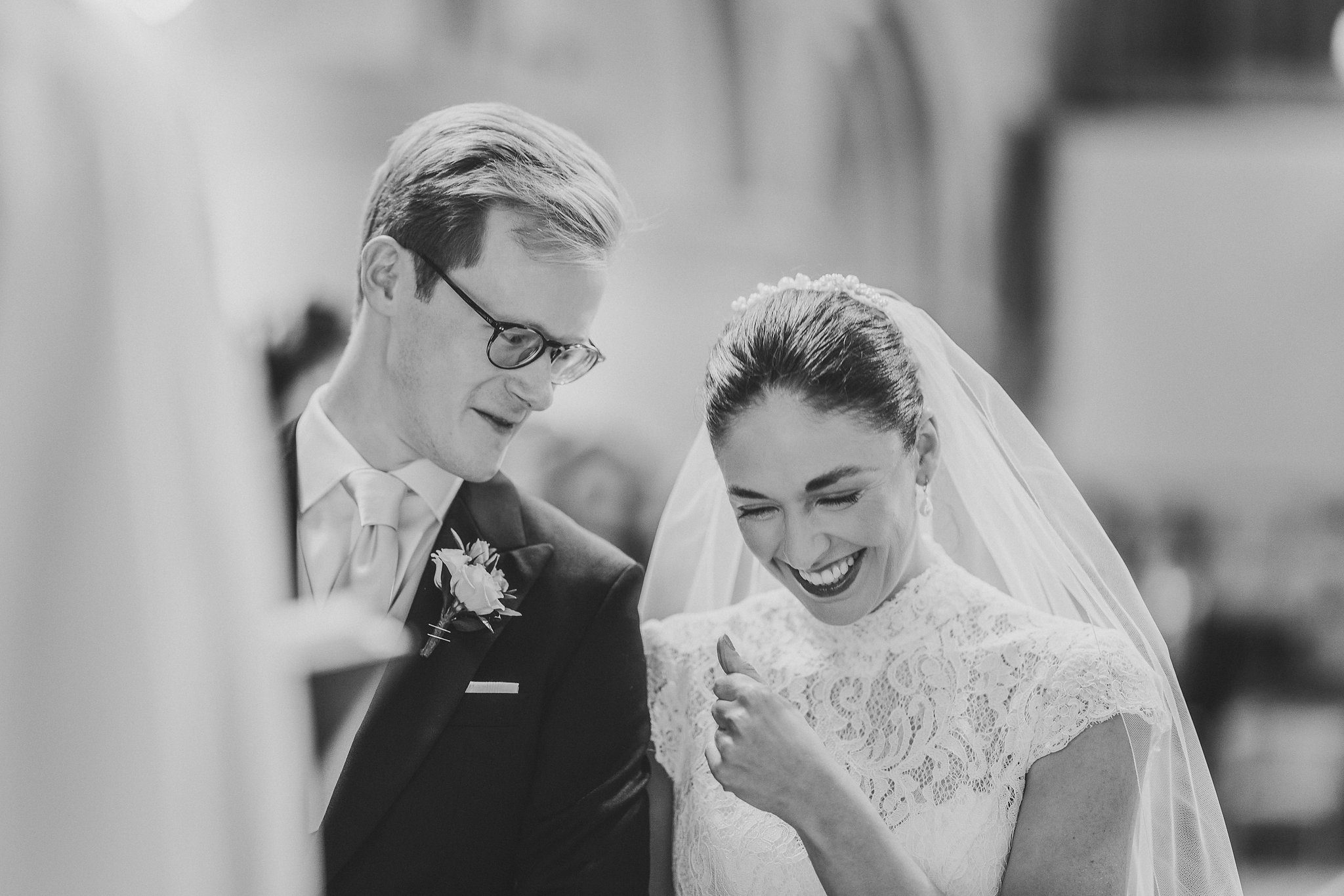 Lucinda laughing with Tom during the ceremony
