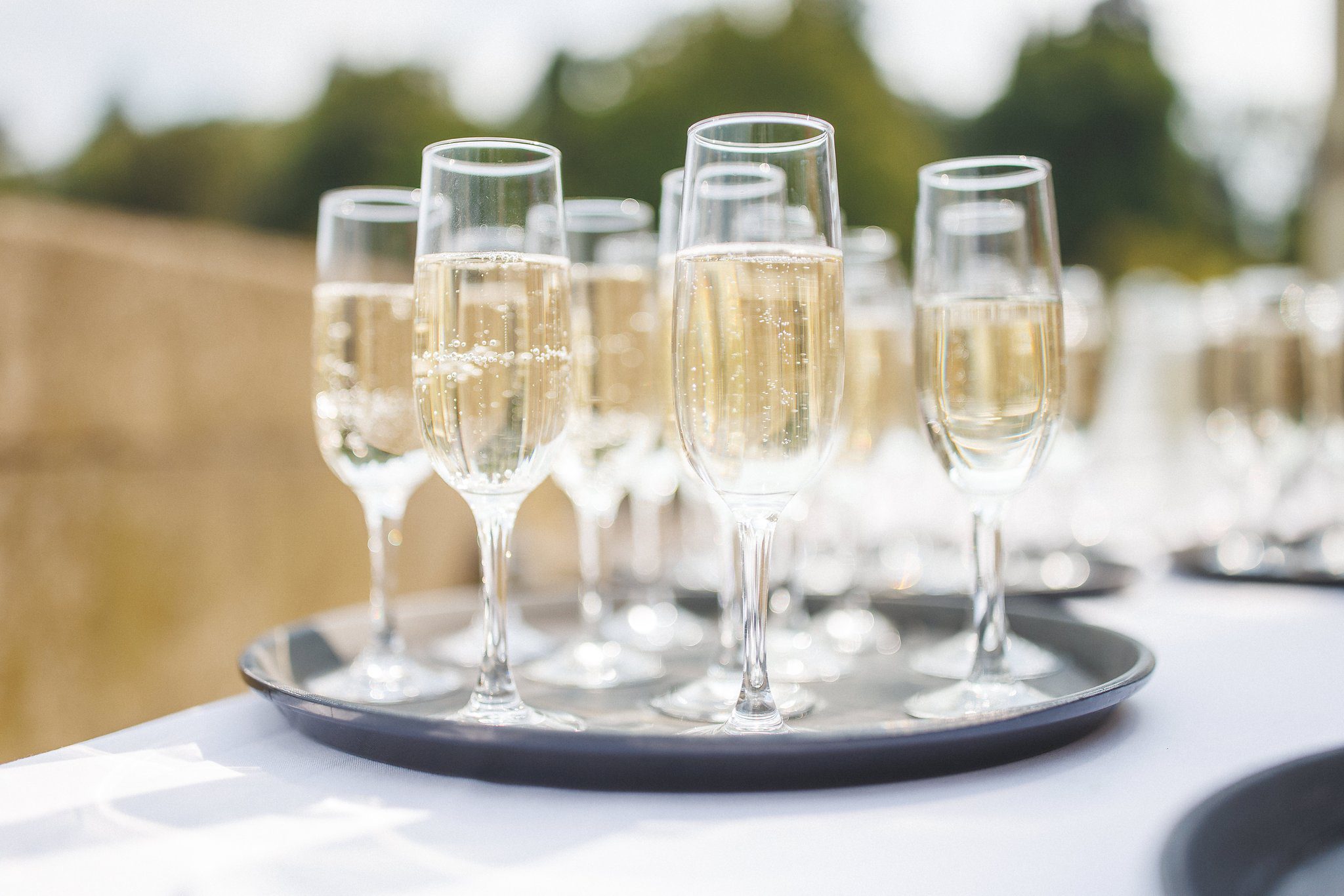 Champagne waiting on a tray for the guests