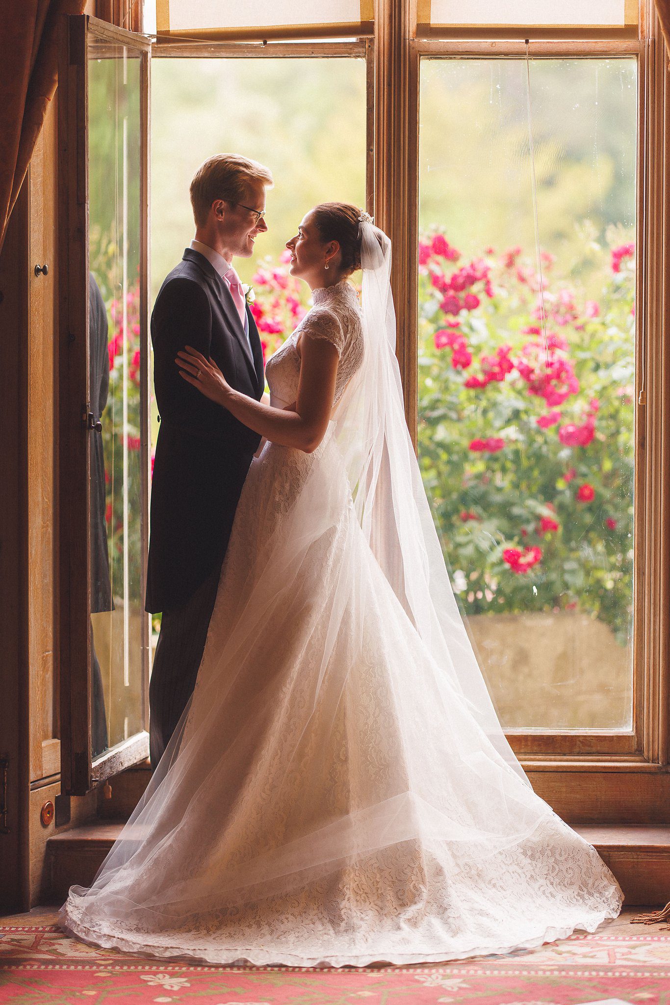 Lucinda and Tom framed in the window at Eastnor Castle