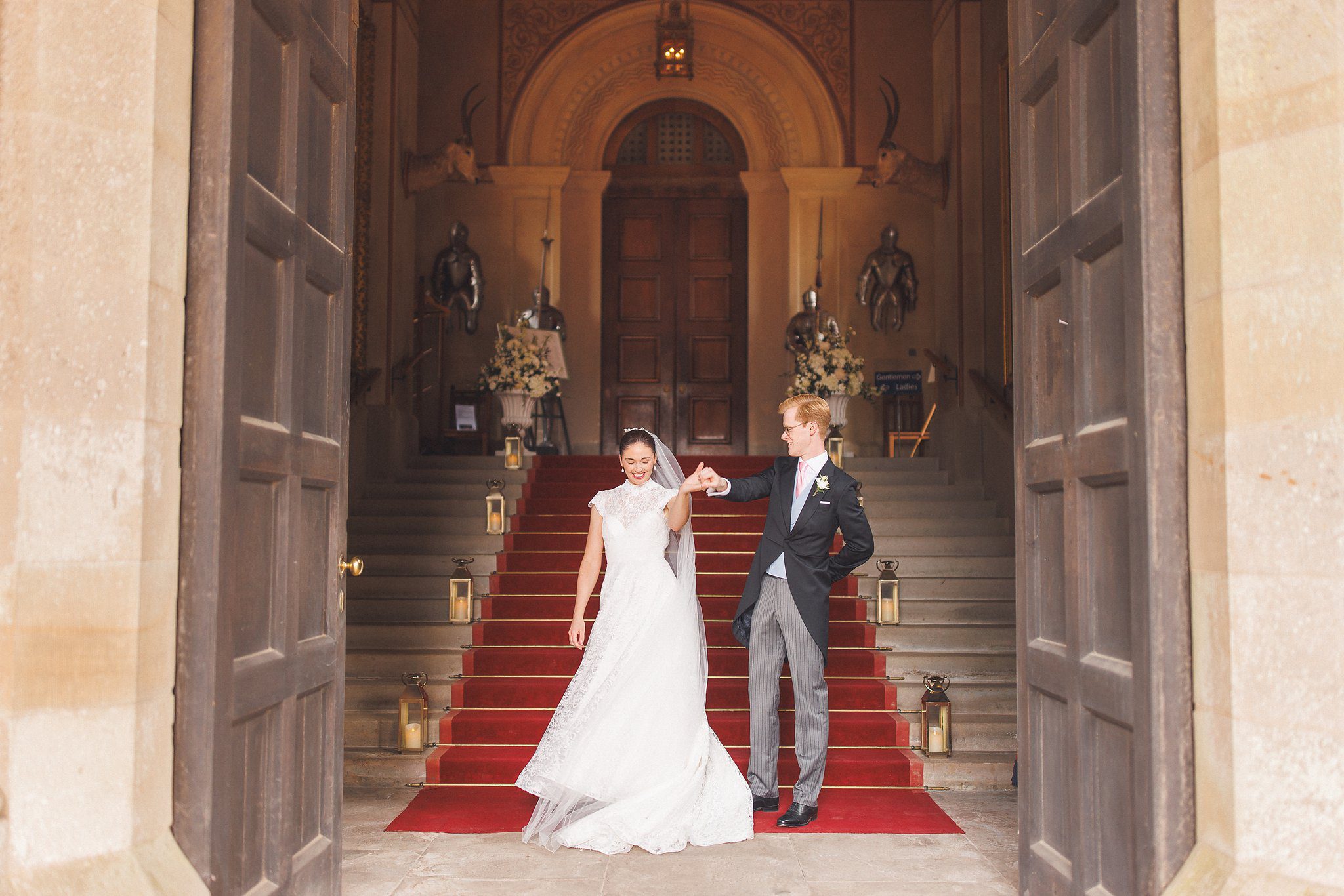 Lucinda and Tom seen through the castle doorway