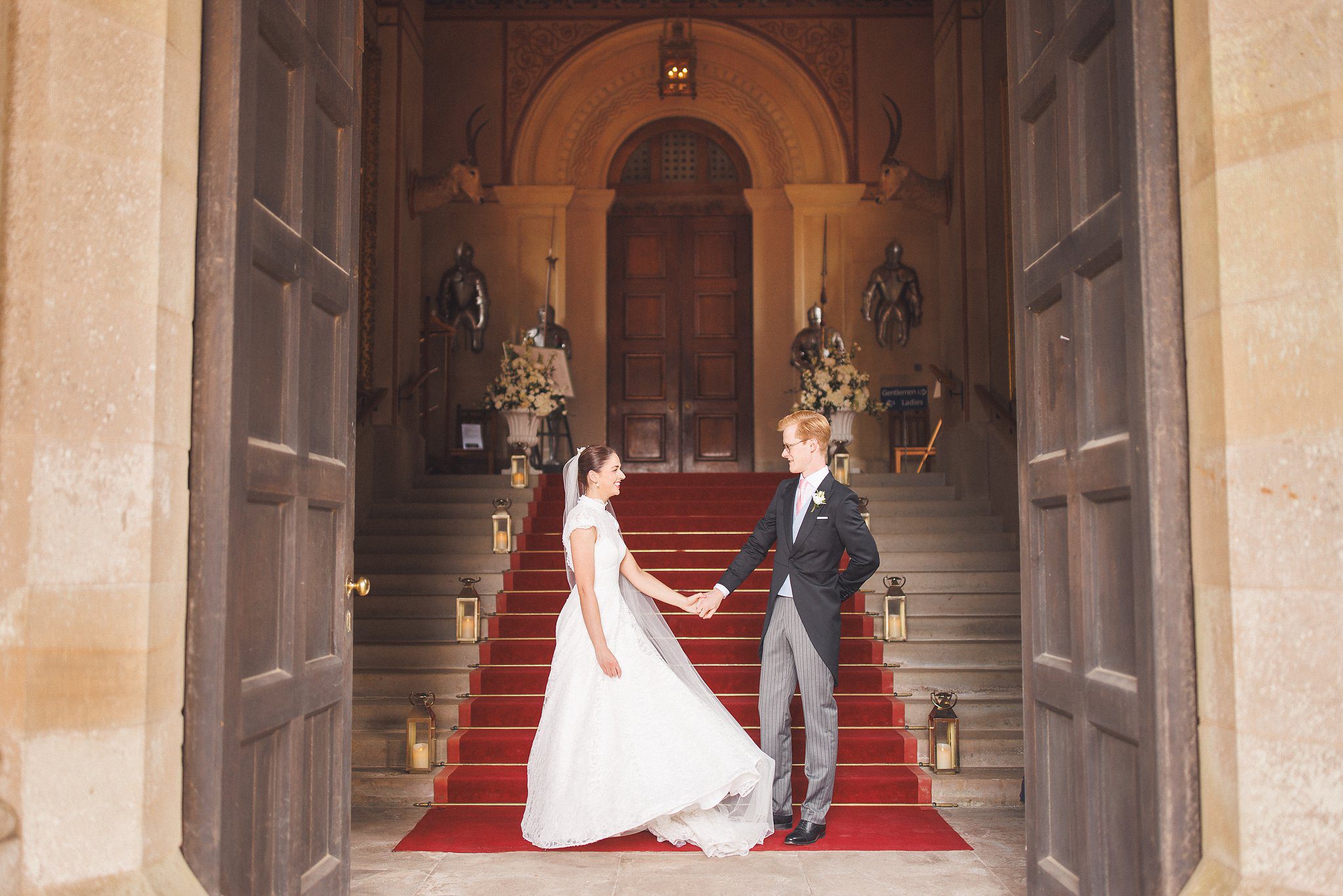 Lucinda and Tom in the doorway of the great hall