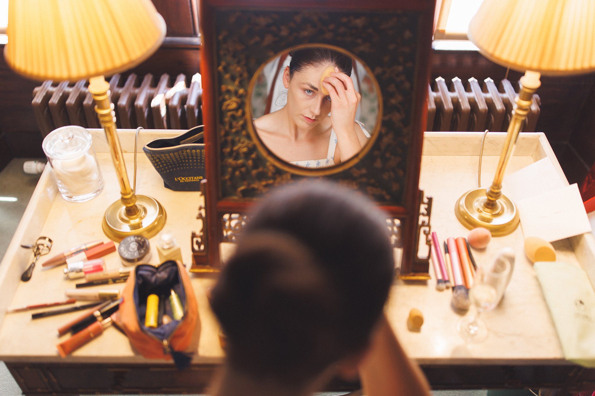 Lucinda reflected in the dressing table mirror