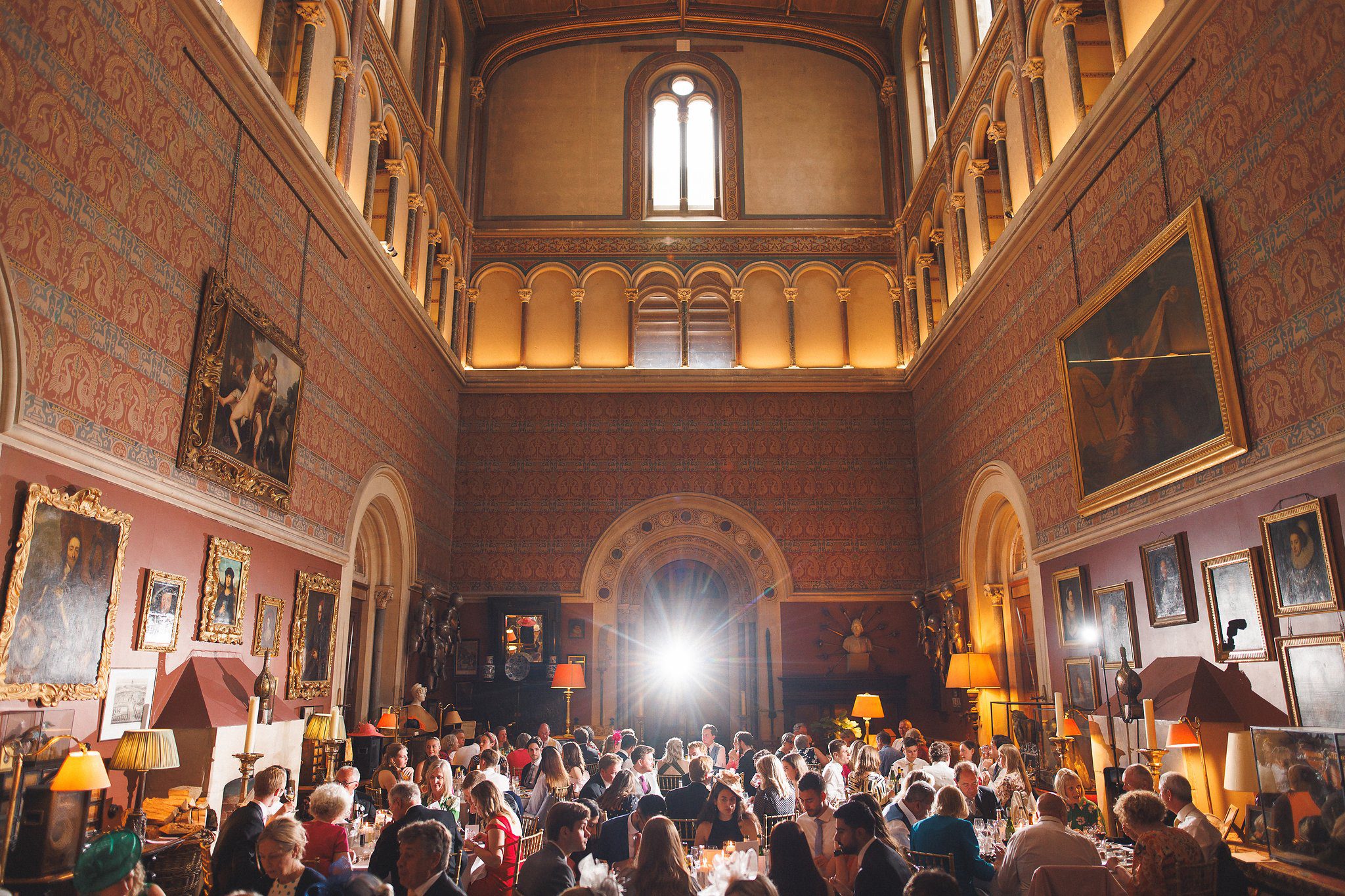 The great hall at Eastnor Castle during dinner