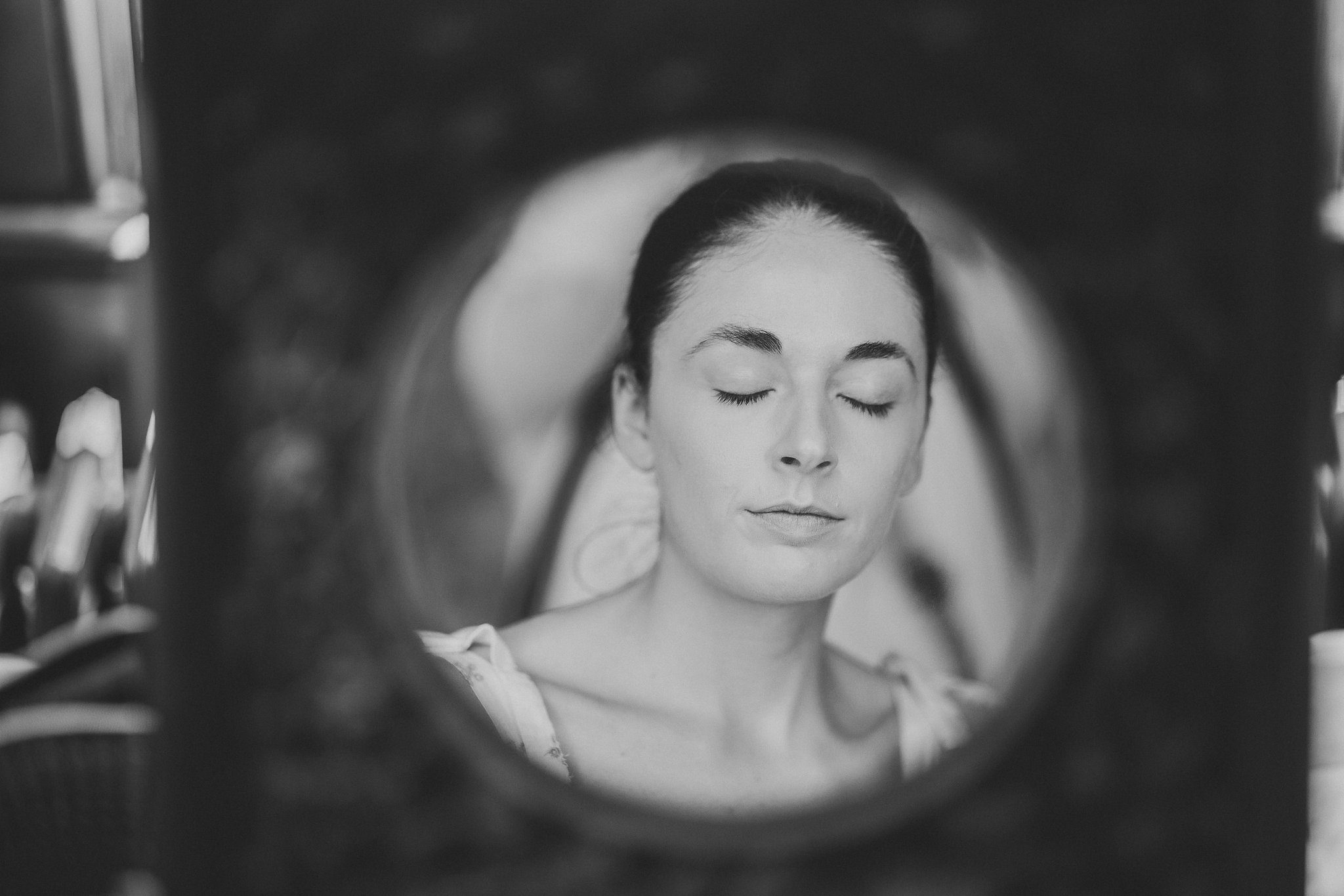 Lucinda having her make-up done, in black and white