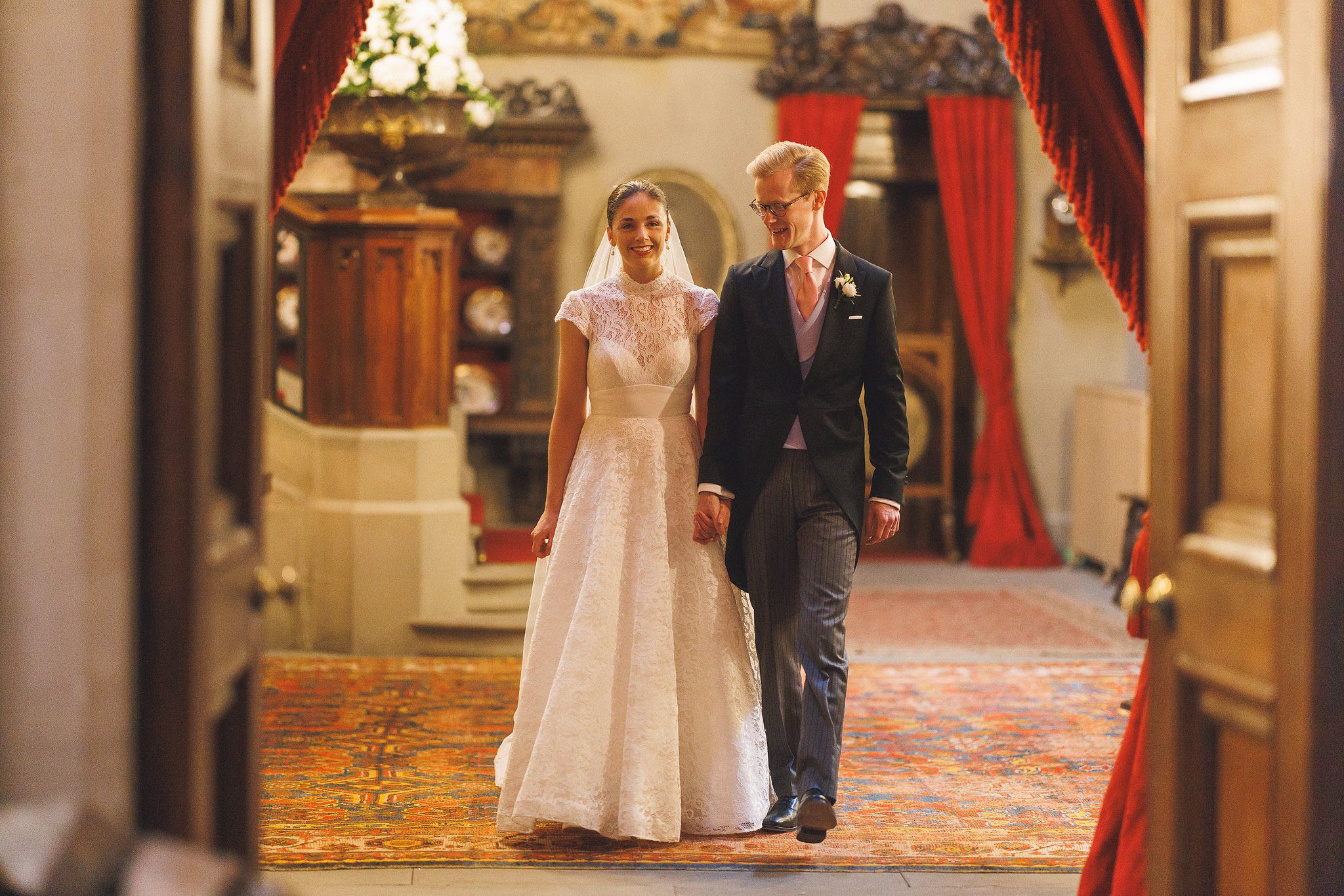 Lucinda and Tom coming along the corridor