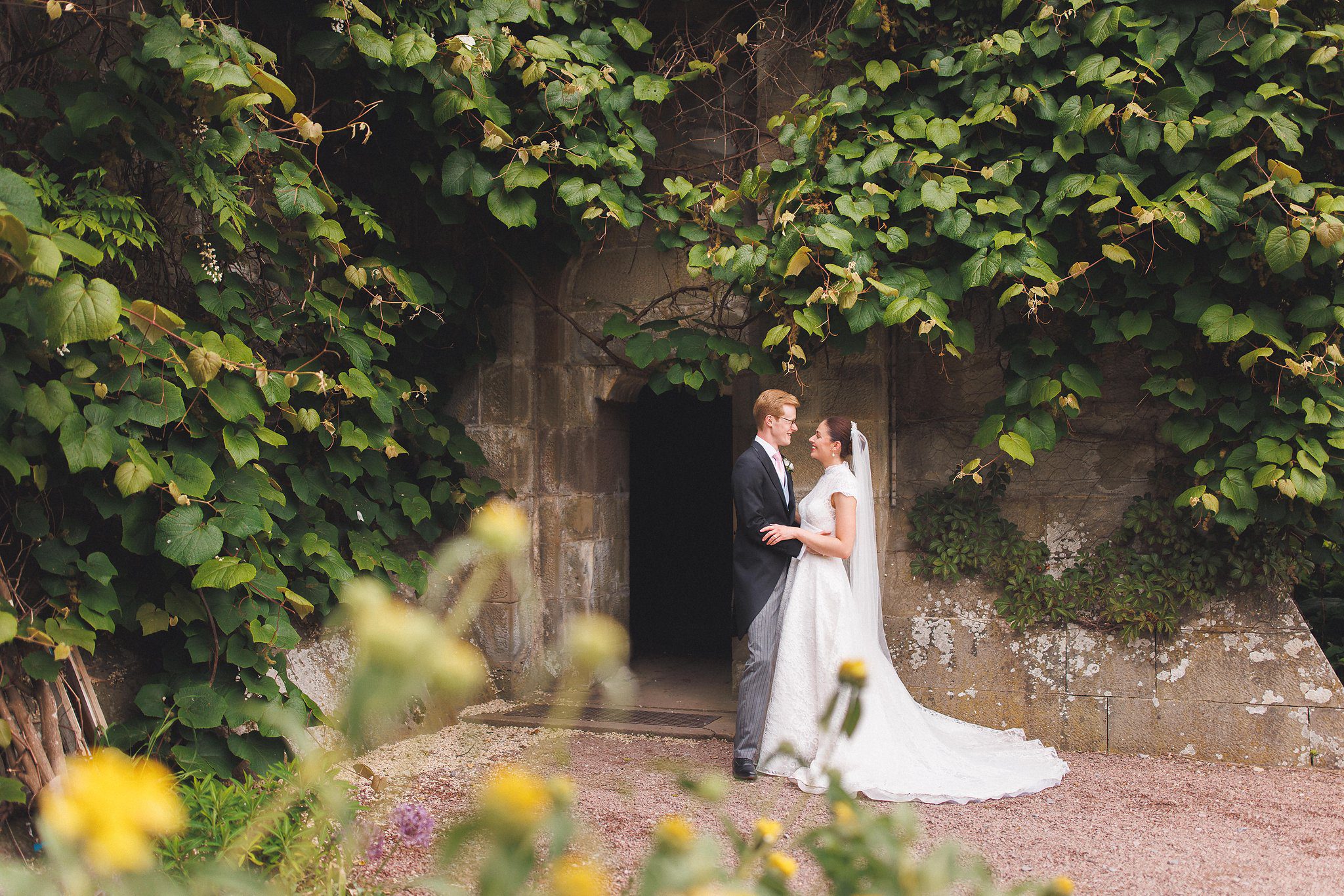 Lucinda and Tom in the ivy-covered doorway
